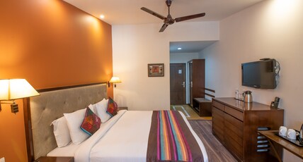 Hotel Rock Manali ( Akhnoor Hotels Pvt. Ltd.) Room Type - Deluxe Room Backside facing Orchard View Hotel Rock Manali ( Akhnoor Hotels Pvt. Ltd.) Room Type - Deluxe Room Backside facing Orchard View