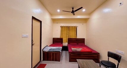 Nandi Inn -1km From Baba Dham Area Room Type - Standard Double Room AC