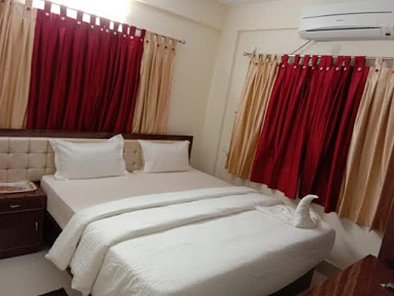 Maha Lakshmi Guest House - Tap to explore photos
