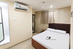 Rooms of FabHotel Bala's Residency