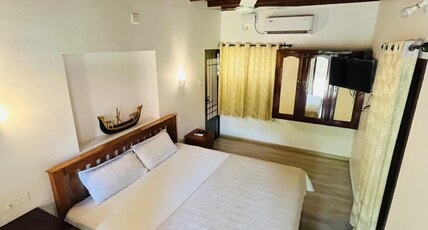 Dove Cottage Cherai Room Type - Deluxe AC Room