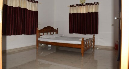 Joy's Homestay Rajapuram Room Type - Standard AC Room