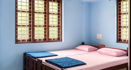 Neon Cliff Stay Varkala Room Type - Deluxe 1BHK Non AC