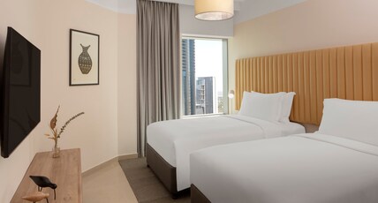 Staybridge Suites Dubai Financial Centre, an IHG Hotel Room Type - 3 Bedroom Suite 2 King 2 Twin Balcony