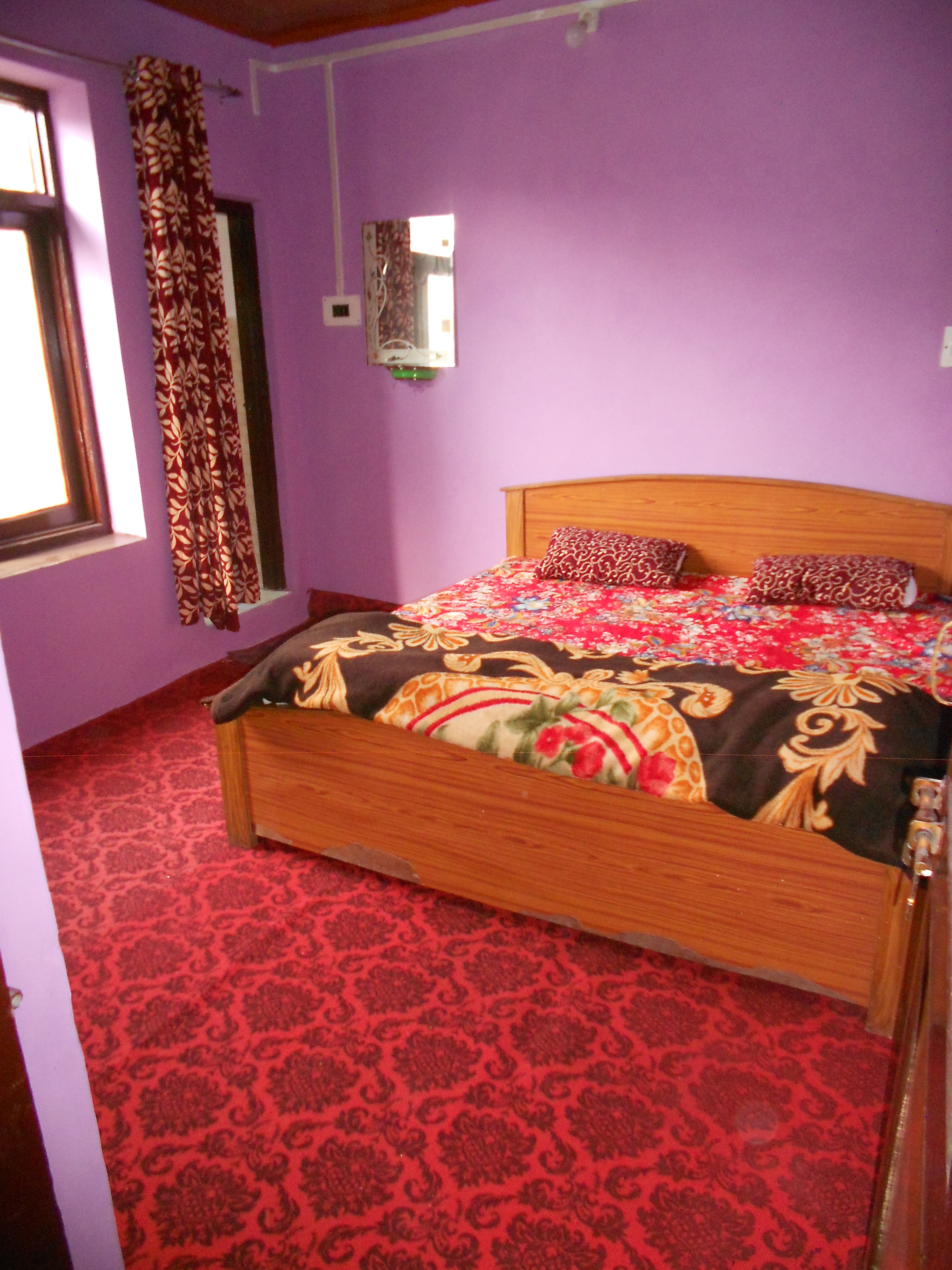 ALAMDAR GUEST HOUSE - Tap to explore photos