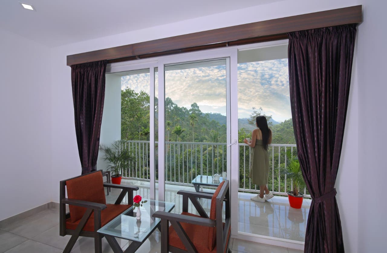 Rainwood Aurum Munnar - Tap to explore photos