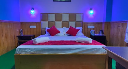 Lachung Inn Room Type - Deluxe Room-Double bed with sofa cum bed Lachung Inn Room Type - Deluxe Room-Double bed with sofa cum bed