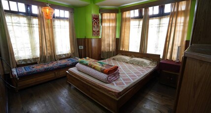 GYAMCHUNGLA HOMESTAY Room Type - Deluxe Rooms