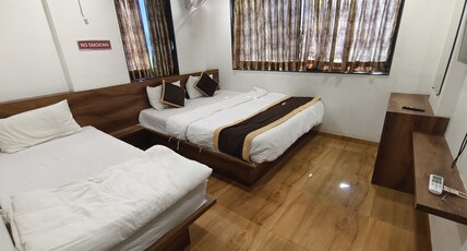 Hotel bramha vieew Room Type - 3 bed A.C room