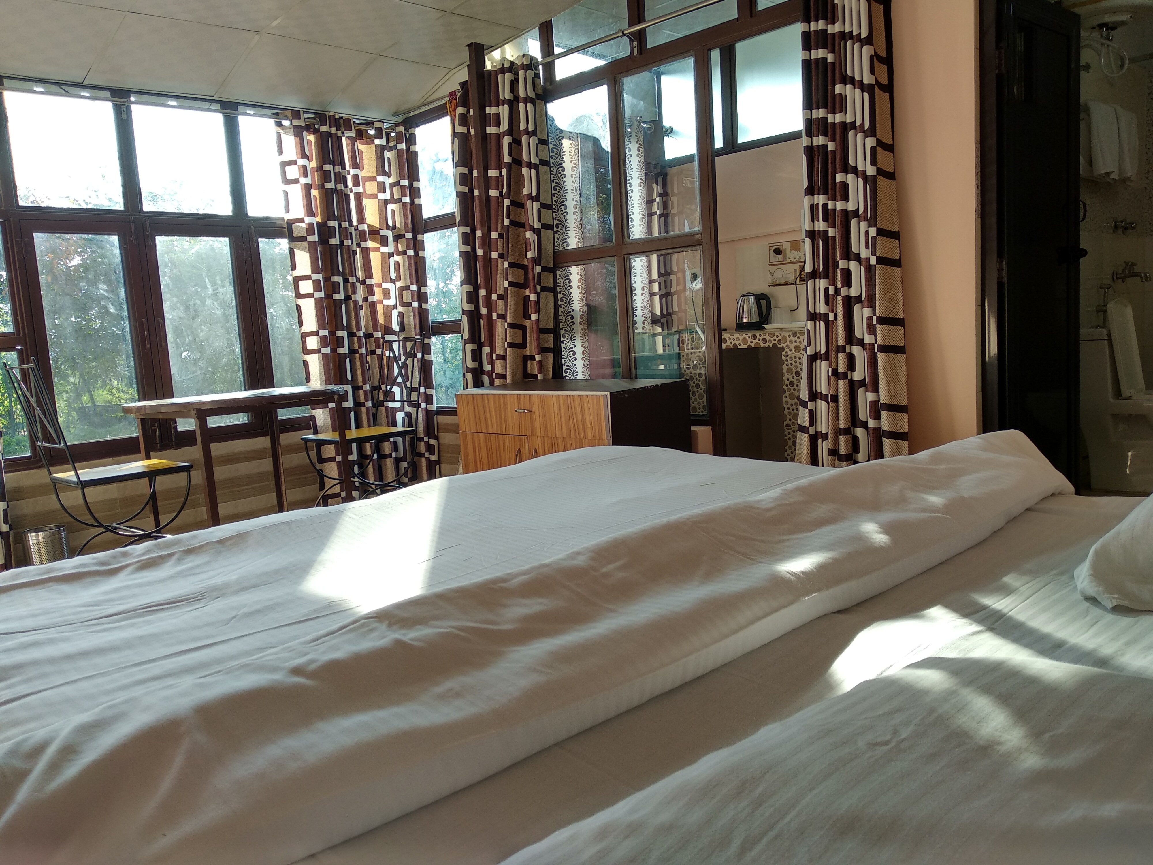 Oxygen Homestay | Rooms & Kitchen - Tap to explore photos