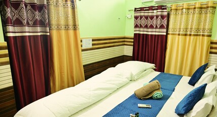 Vaidehi Homlee Premium Stay Room Type - Deluxe AC Room