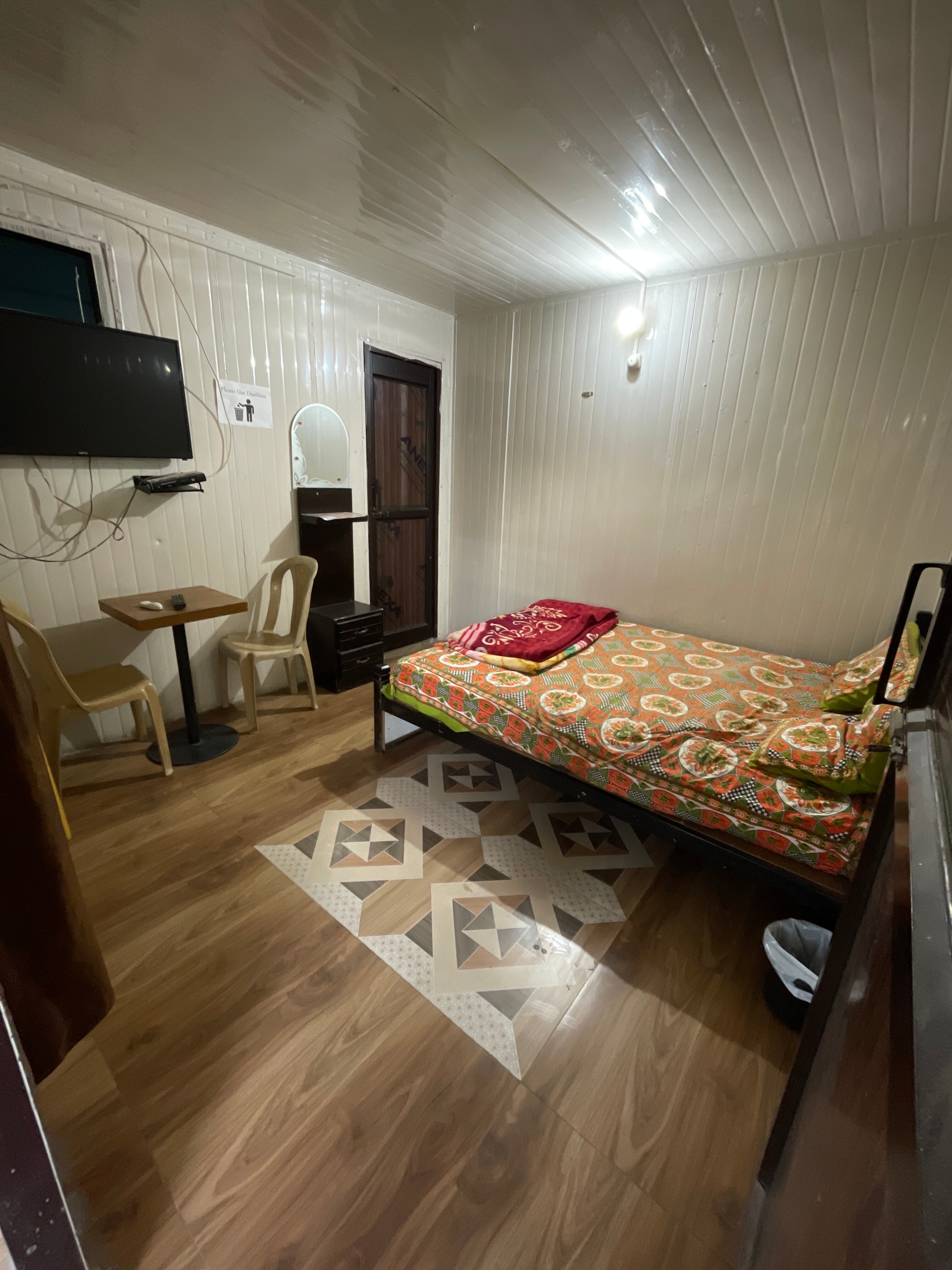 Hotel O Home Hotel Friontier - Tap to explore photos