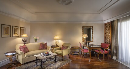 The Leela Palace Bengaluru Room Type - Executive Suite with Pool or Garden View Balcony, BMW Airport Transfers and Cocktail hours