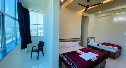 Krishna Paradise Room Type - Deluxe Double Bed Room