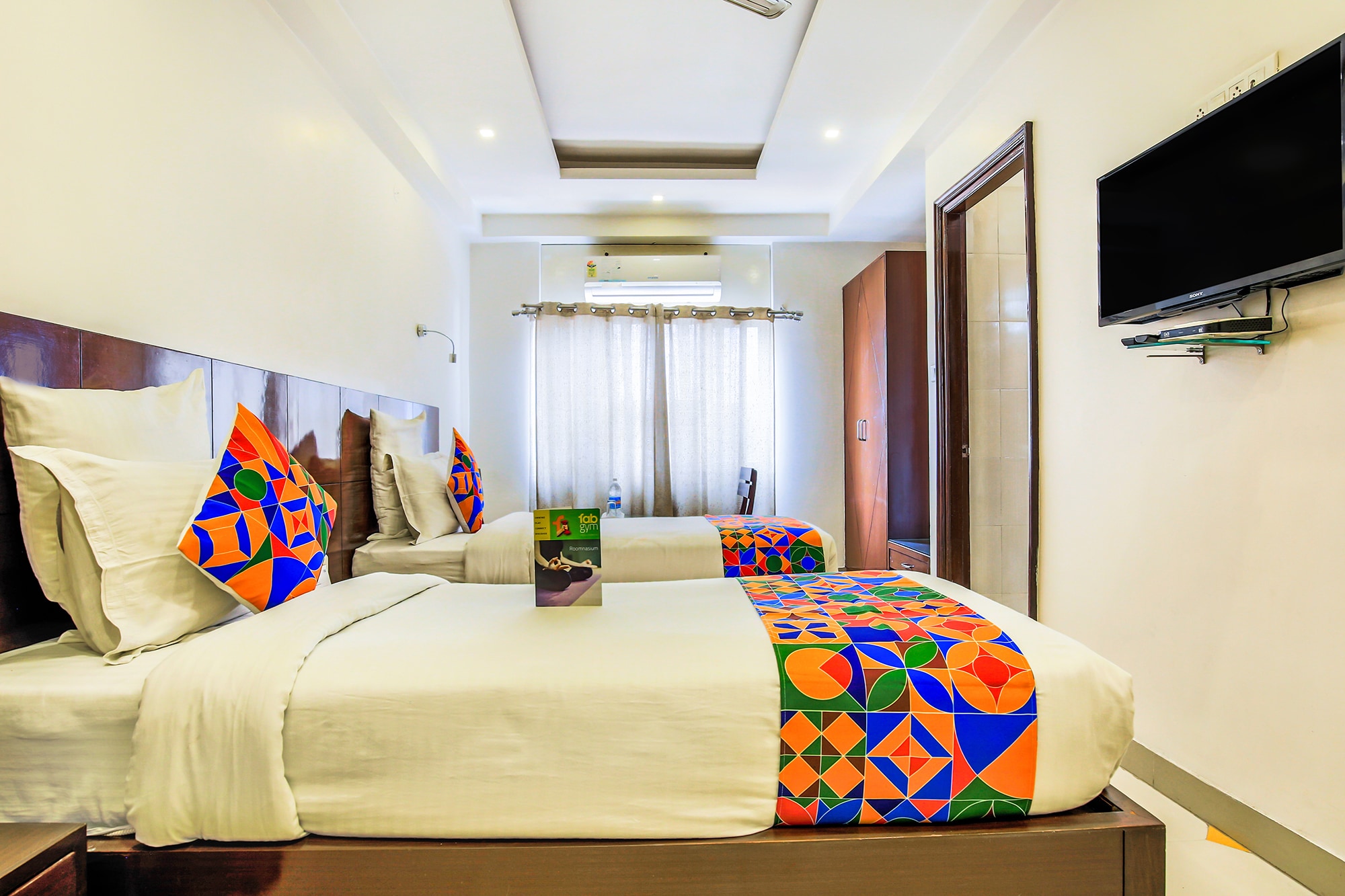 FabHotel Tipsyy Inn Suites - Tap to explore photos