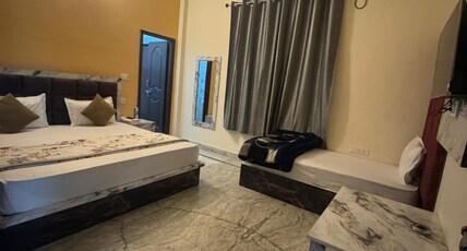 BHAGIRATHI RESIDENCY Room Type - Non - AC Triple Bed Room