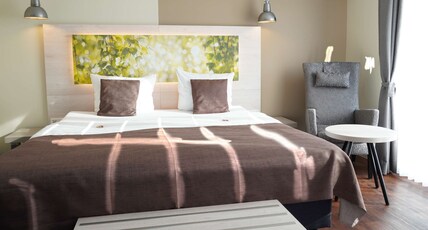 Best Western Hotel St. Michael Room Type - 1 King Bed, Standard Room, Flat Screen Television, Work Desk, Sitting Corner, Kettle, Free W-Lan Best Western Hotel St. Michael Room Type - 1 King Bed, Standard Room, Flat Screen Television, Work Desk, Sitting Corner, Kettle, Free W-Lan
