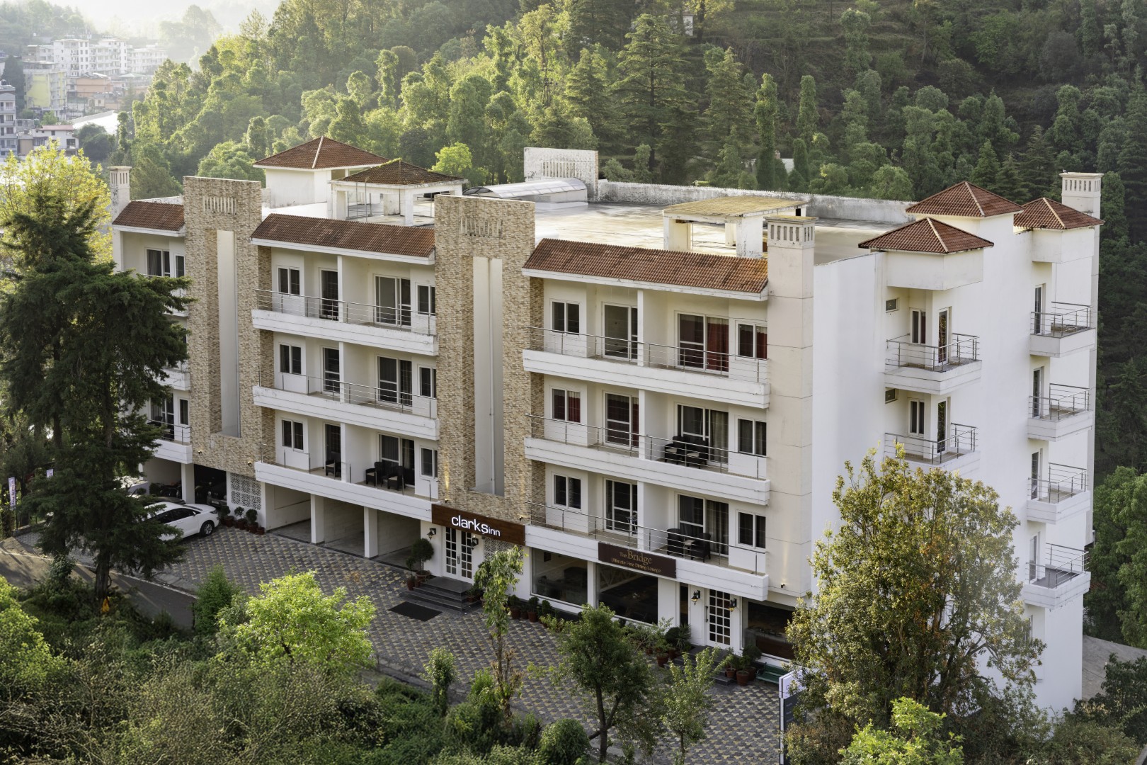 Hotel Clarks Inn, Bhowali (20 Mins from Neem Karoli Baba Ashram, Kainchi Dham) - Tap to explore photos