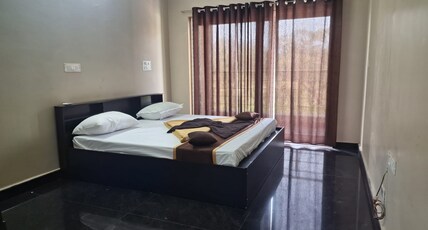 AAADINATHAN ELITE RESIDENCY Room Type - DELUXE ROOM