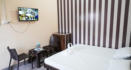 Royal Guest house Room Type - Deluxe Room with Air Conditioning