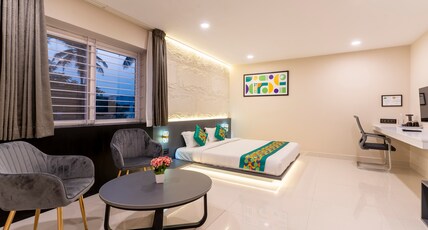 Treebo Sanmaya Retreat, Mysore Room Type - Spacious Deluxe Room With Seating Area