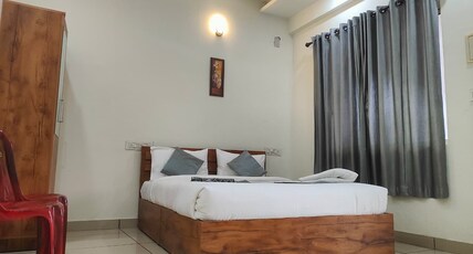 Homey Residency | Vythiri Bus Station Room Type - Deluxe Room