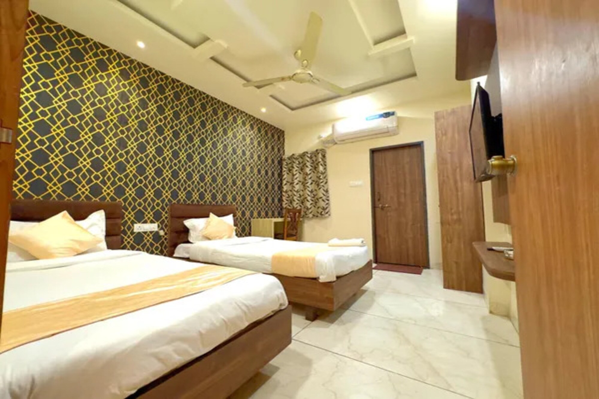FabHotel Zamzam Residency - Tap to explore photos