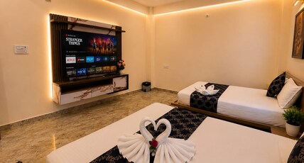 Hotel Raveera Inn Room Type - Deluxe Family Room
