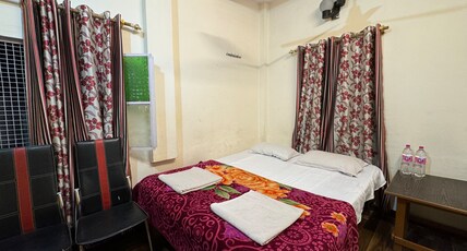Golden Lodge Room Type - DOUBLE BED NON AC ROOM WITH COMMON BATHROOM