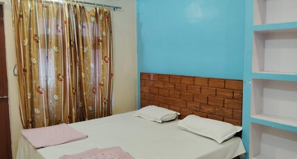 Om Palace Home Stay Room Type - A.C. Bedroom 202