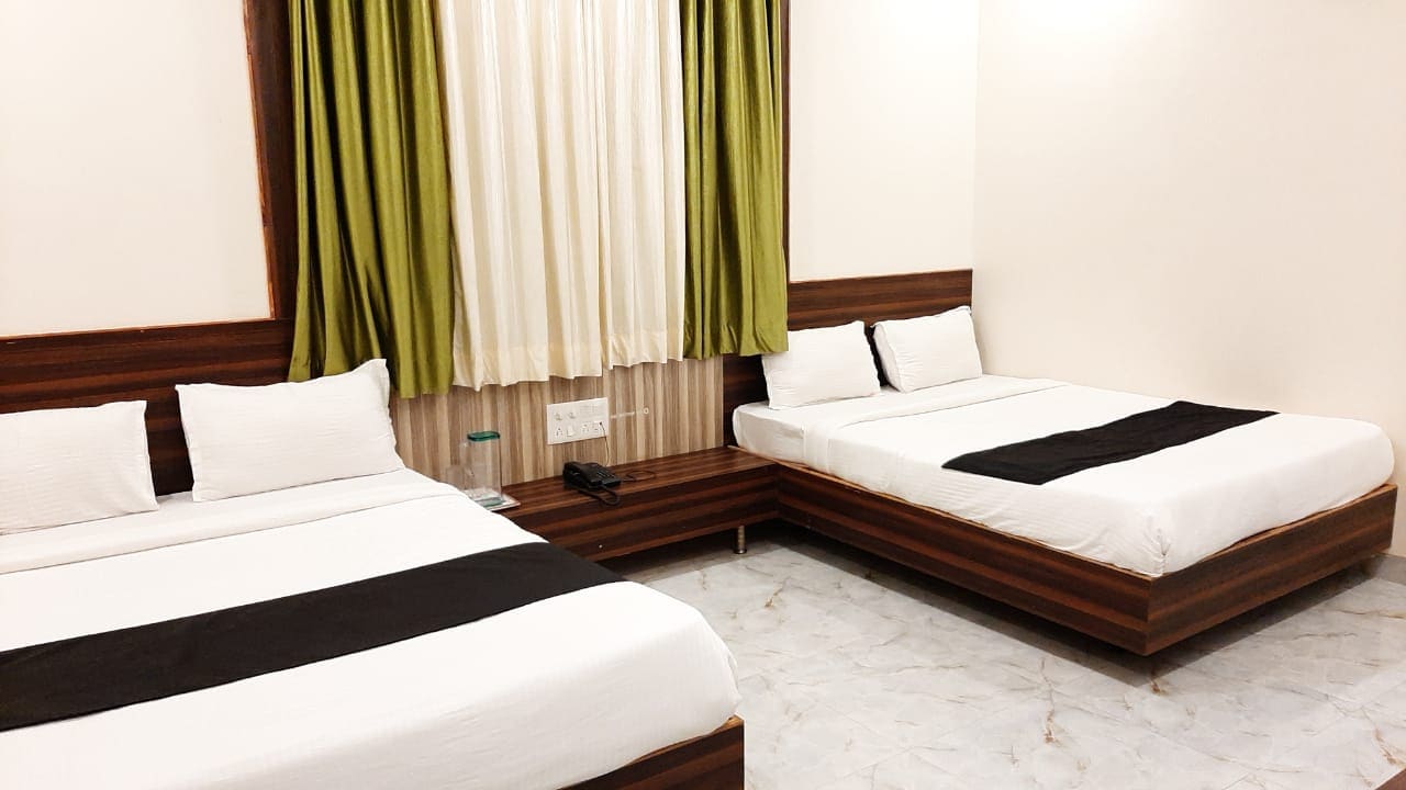 Liva Rooms Kopargaon and Restaurant - Tap to explore photos
