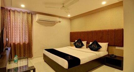 7th Heaven Hotel Apartment - Manipal Room Type - DeluxeSuites