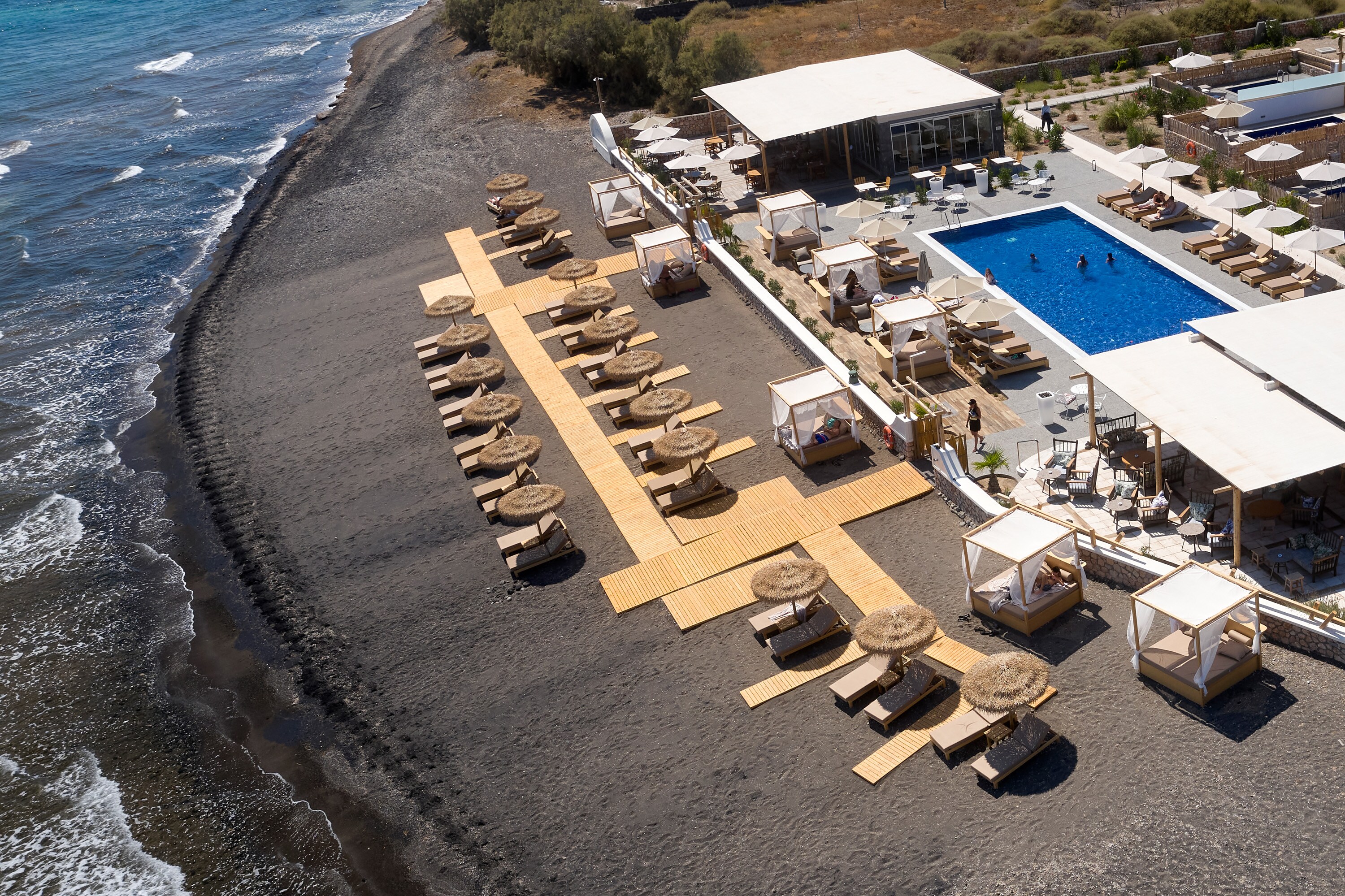 Sea Breeze Santorini Beach Resort, Curio Collection by Hilton - Tap to explore photos