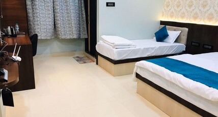 Hotel Shri Shankar Inn Room Type - Triple Bedded Room