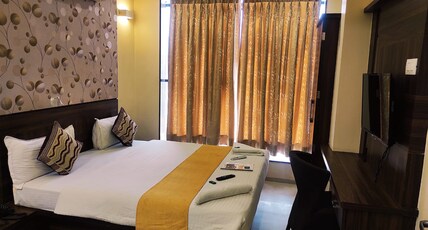 Hotel Manasi Pride Room Type - Deluxe Non AC Room