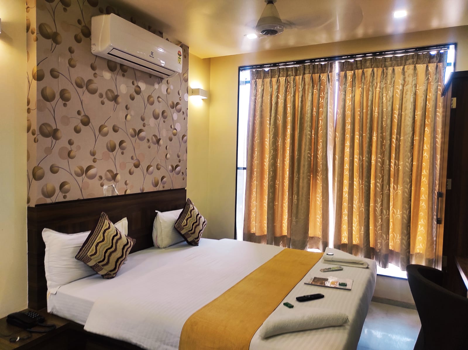 Hotel Manasi Pride - Tap to explore photos