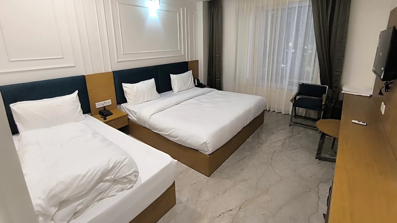 HOTEL VIJAY VARDHAN INN - Tap to explore photos