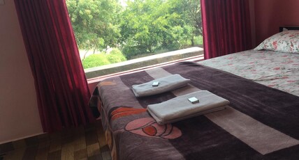 Leo Comfort RiverSide Cottage Room Type - DELUX AC POOL VIEW COTTAGE