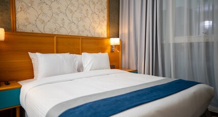 Reya Creek Hotel Room Type - Deluxe King Room