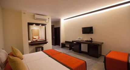 Oak Ray City Hotel Room Type - Deluxe Room