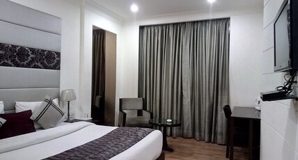 HOTEL ORCHID Room Type - DELUXE ROOM