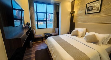Hotel Santosh Regency Room Type - Ganga View Room-Single Occupancy not allowed Hotel Santosh Regency Room Type - Ganga View Room-Single Occupancy not allowed