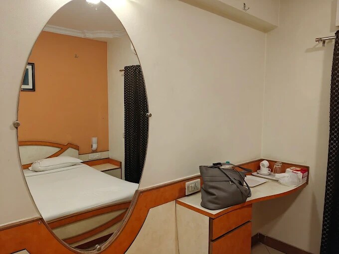 Hotel Heritage Residency Kalyan, 4 km from Kalyan Railway Station - Tap to explore photos