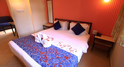 Aastha Escape Resort Near Calangute Beach Room Type - Honeymoon Suite with Balcony and Pool View Aastha Escape Resort Near Calangute Beach Room Type - Honeymoon Suite with Balcony and Pool View