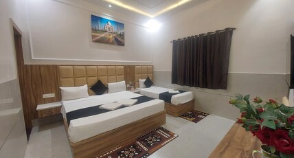Taj Belleza Vista By Trippizo Room Type - Family Deluxe Room with Garden View Taj Belleza Vista By Trippizo Room Type - Family Deluxe Room with Garden View