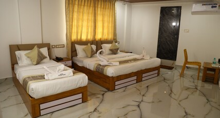 GRAND TAMIM HOTEL Room Type - DELUXE TRIPLE AC