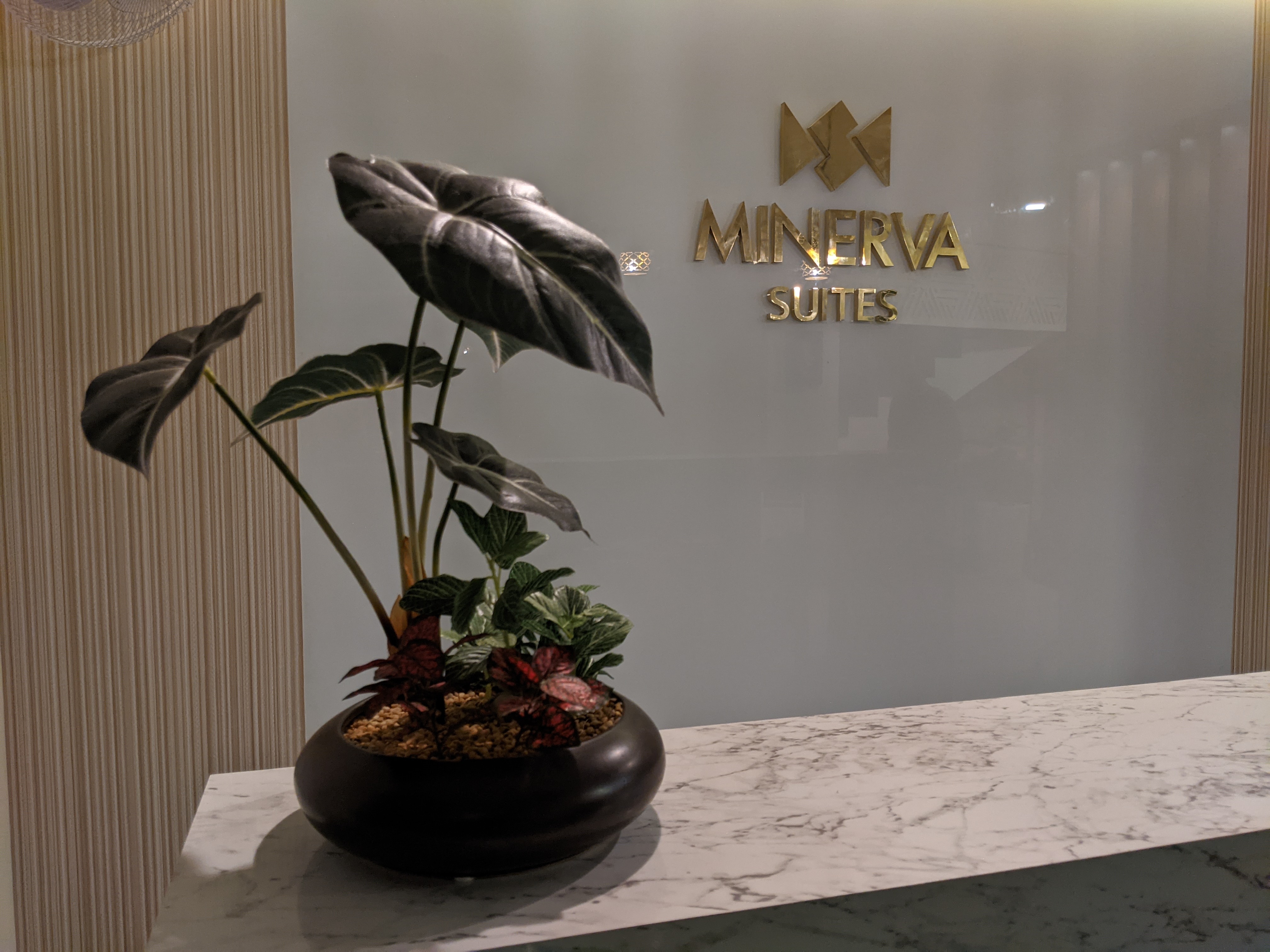 Minerva Suites - Tap to explore photos