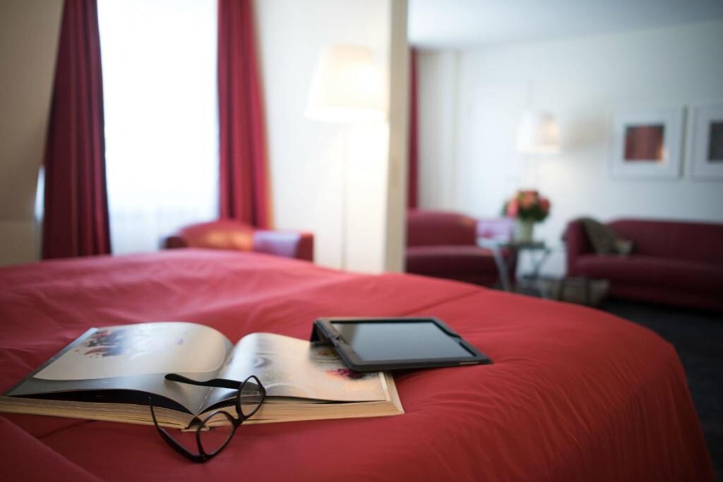 Hotel Glockenhof - Tap to explore photos