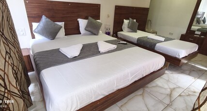 Hotel Sky Room Type - Deluxe Three Bed AC