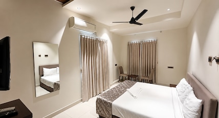 Hotel GMR Pearls Room Type - Deluxe AC King Room Hotel GMR Pearls Room Type - Deluxe AC King Room